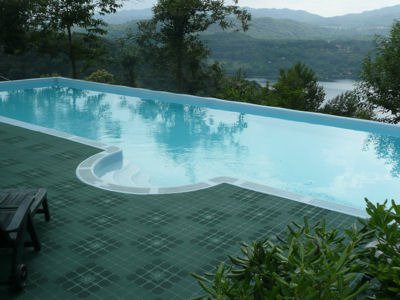 New tiled green decking around the swimming pool at Villa Gelsomina
