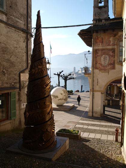View from La Motta towards the island, with the Palazzotto on the right, and two of the stunning sculptures by Arnaldo Pomodoro that were dotted around Orta - January 2009