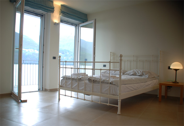 Spacious Master Bedroom with panoramic lake views