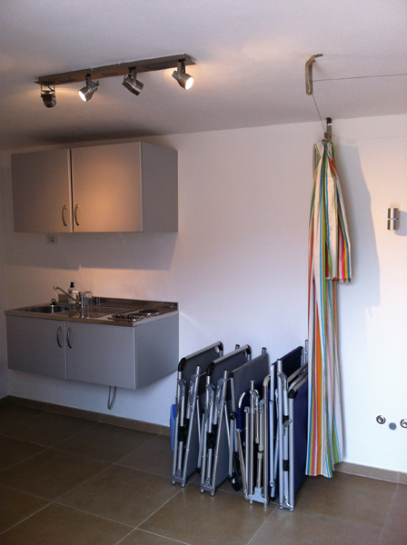 Summer Kitchen next to the lake-side swimming area