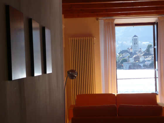 Giove and Venere, two stunning new apartments in Piazza Motta, with views over the piazza, of Lake Orta, and of the island.
