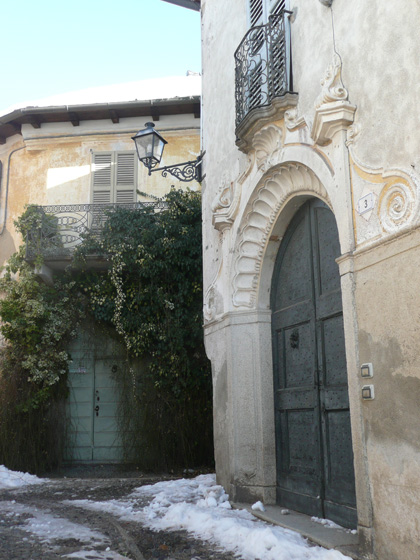 Characteristic cobbled side street of Vacciago, with art deco ironwork (winter picture, taken 15/2/2012)